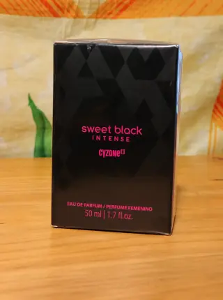 perfume Sweet black intense Foto