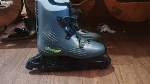 Rollers o patines con mochila Foto