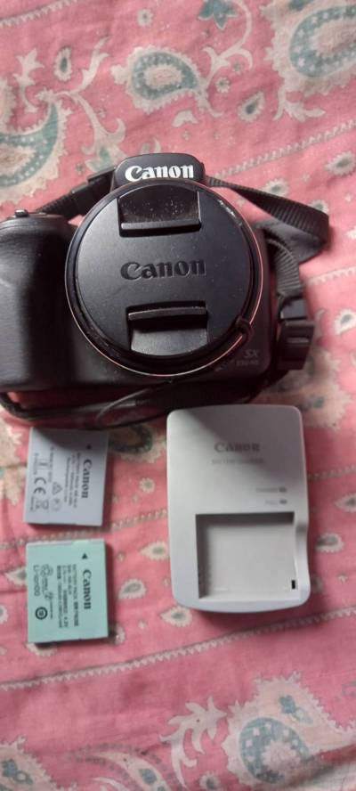 lo vendo por falta de uso camara canon Foto